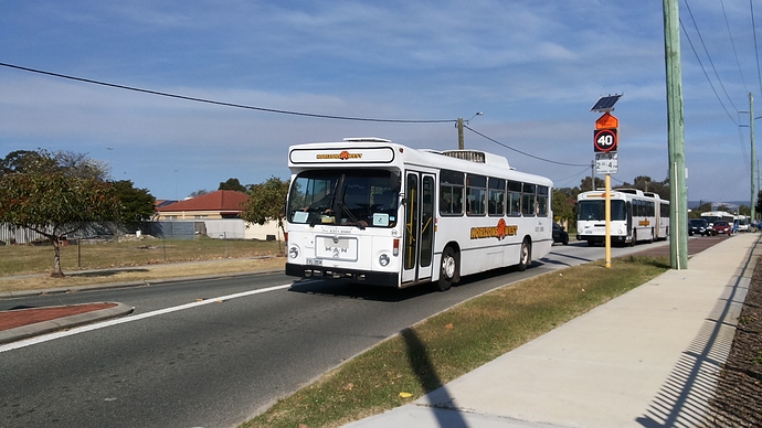 Horizons_West_MAN_SL200_(PMCSA_Commuter)CVL2834%40_Centre_Street_%26_Treasure_Road%2CQueens_Park